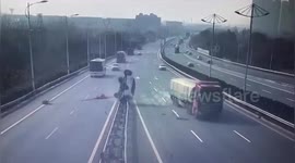 Car tips over on Chinese highway after illegally changing lanes and being crashed into by truck