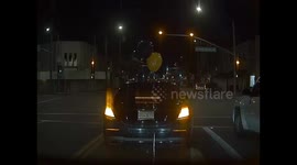 'Like a scene from IT' - balloon floats across road in eerie dashcam footage captured in LA