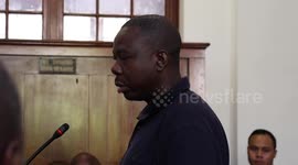 Refugee leader in court on assault charges