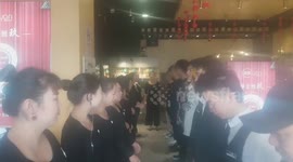 Chinese hair salon employees cheer themselves up with morning dance routine