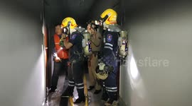 Hundreds of tourists evacuated after fire rips through apartment block in Thailand