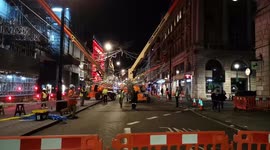 'Fallen Angel' descends as London takes down Christmas decorations