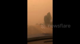 Motorists face extremely low visibility as smoke from bushfires shrouds Australia's roads