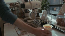 Guy making an Americano (coffee) only sound fx used