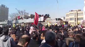 Thousands of mourners take part in funeral procession for Iran's top general Qassem Soleimani