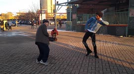 92-year-old grandpa engages in epic dance-off with Chicago street performer