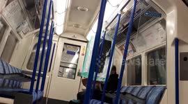 Creative London Underground passenger spotted hanging dry cleaning from overhead handle