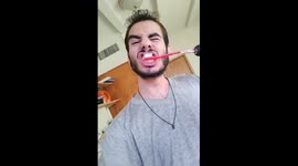 Brazilian man brushes his teeth with 'drill toothbrush'