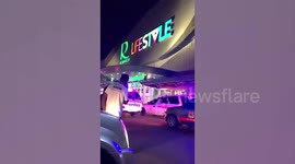 Police outside shopping mall in Thailand after mass shooting by gold shop robber