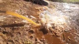 Cold snap in north India causes hoses to spray icy slush instead of water