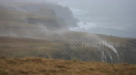 This is the amazing moment water appears to flow BACKWARDS up a waterfall