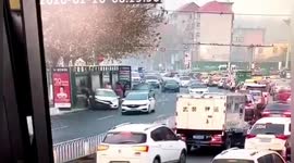 Car smashes into bus stop, injuring four people after colliding with another vehicle in China