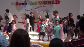 The children's day party at Pathumthani, Thailand was a too much for one little star who had to be taken off stage in tears.