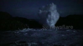 Storm Brendan: Big waves pound Northern Ireland coast in the moonlight