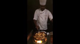 Sri Lankan chef cooking a crabs.