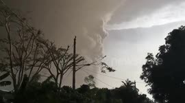 Dark grey cloud fills sky from Philippines’ Taal volcano