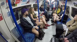 Londoners travel on the Underground on 'No Trousers Tube Ride' day