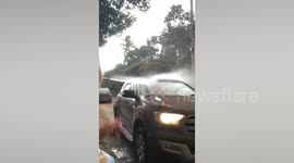 Volcanic ash covers cars in the Philippines after Taal volcano erupts