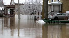 Record rainfall sees river banks burst and roads submerged in Ontario
