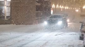 Cars driving in heavy snow in Gastown 12/01/20