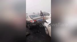Thick fog causes huge 31 vehicle pile-up on bridge in China, leaving two people injured