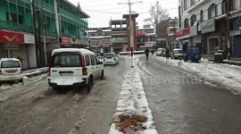Heavy rains ,snowfall turnes roads into water stream in Srinagar City Jammu and Kashmir , Disruptes normal life