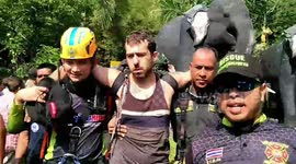 Austrian parachutist winched to safety after getting stuck 820ft off the ground