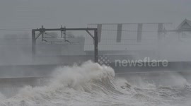 Waves crash into Ayrshire coastline as Storm Brendan blows across Scotland