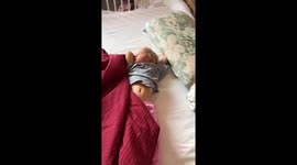 Adorable toddler is having a hard time to wake up!