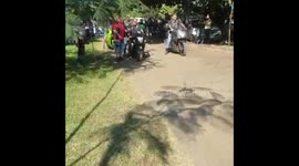 Above knee amputee doing a slow race on a motorcycle!!