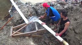 Flash floods in Indonesia leave thousands under threat from clean water crisis