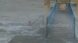 'Nice day for a dip': Man goes swimming off Irish coast during Storm Brendan