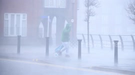 Storm Brendan: Heavy rain and strong winds batter city of Swansea, Wales