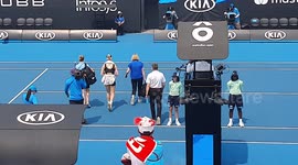 Eugenie Bouchard escorted off court after suffering breathing difficulties as smoke from bushfires disrupts Australian Open