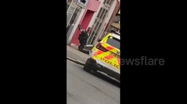 Moment police arrest man with packages strapped to his body in Derby city centre