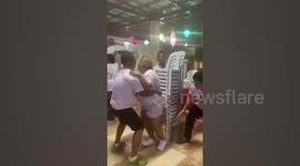 Bizarre office game in Philippines is chair-stacking chaos