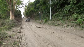 Taal Volcano Crisis - Large Cracks Damage Road