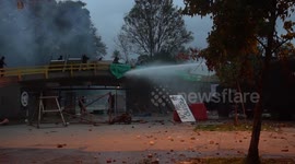 Protesters and police clash in Bogota on eve of planned mass anti-government protests