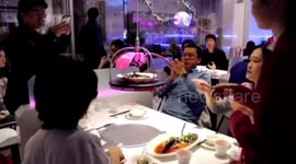 China's first fully automatic restaurant launches with robot staff