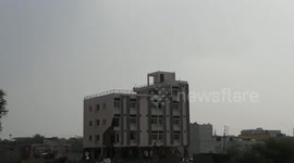 Residential building demolished by municipal authorities due to illegal construction in central India