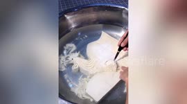 Chinese cook carves vivid animals out of tofu blocks