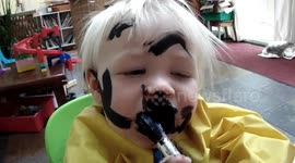 Baby Picasso paints his own Face