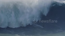 Brazilian surfer Felipe Cesarano flattened by monster 60ft wave at Nazare