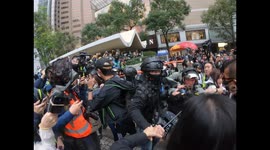Scuffles break out between protesters and riot police in central Hong Kong