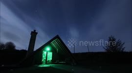 Stock footage showing timelapse of glamping pods and stars in the nightsky