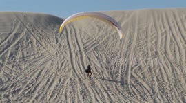 Paragliding in Halfmoon beach of aziziah , aziziah , khubar ,Saudi Arabia