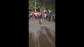 Tourists participate in a professional jump rope on Vietnam street