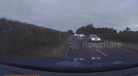 Hair-raising near miss for Car against overtaking white van caught on dashcam