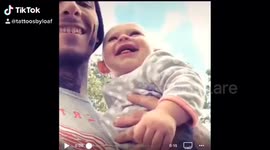 Baby laughing at bad golf swing.