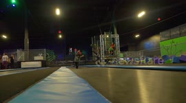 Boy on trampoline attempts backflip but misses landing